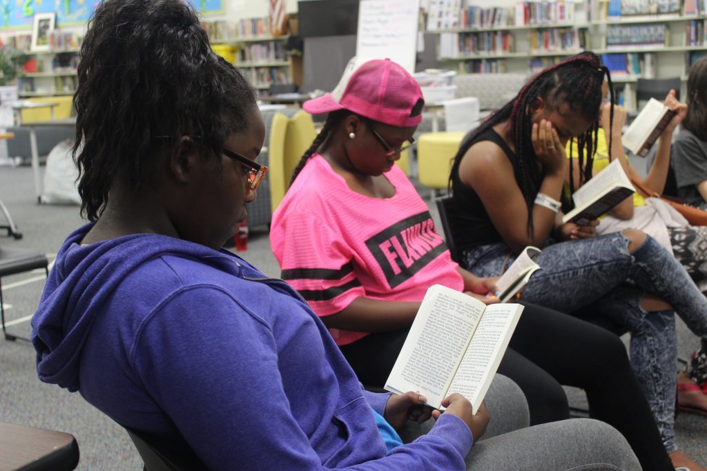 Firewall Centers students reading books